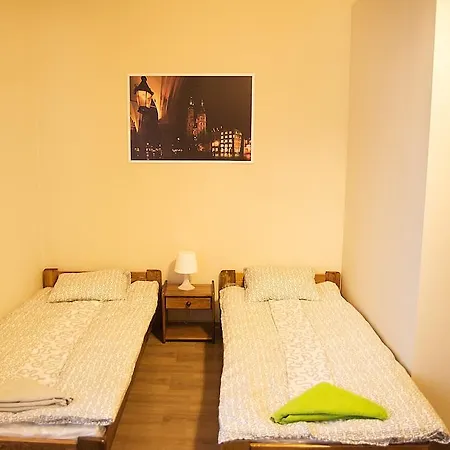 Quarto em Acomodações Particulares Pokoje Stare Miasto *